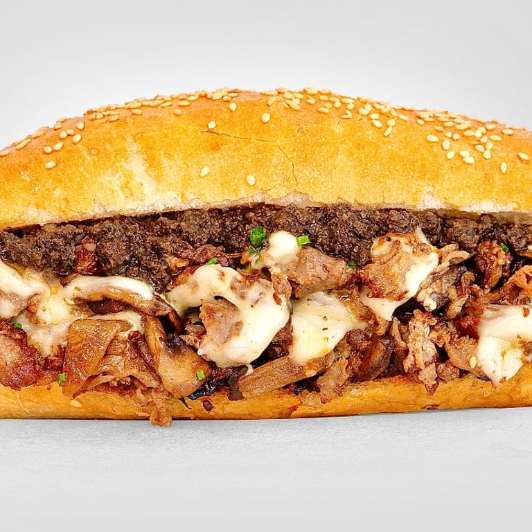 Indulge in Our Cheesesteak